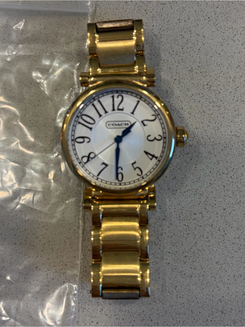 Women’s Coach Gold-Tone Bracelet Watch with White Dial and Blue Hands